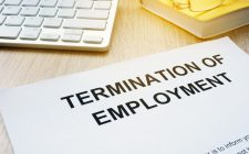 Termination of Employment on an office desk.